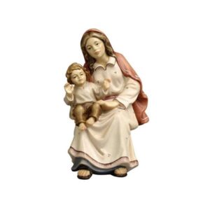 Pastora sentada con niño