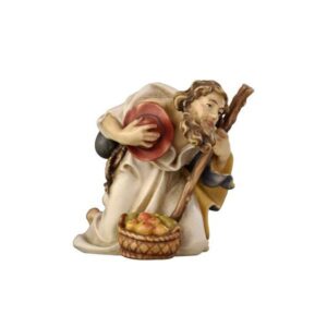 Pastor arrodillado con bastón